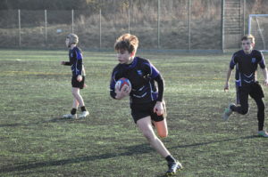 boys playing rugby