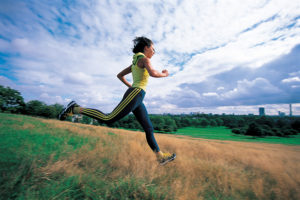 Person running across a field