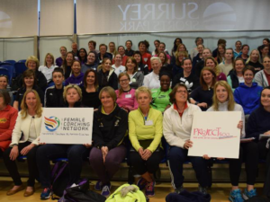 photo of attendees at female coaches conference