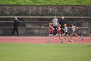 girls running on a track