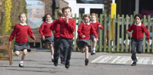 Children running in the playground