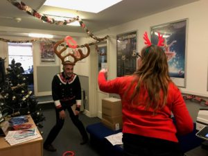 Your Leisure staff playing Christmas games in their office