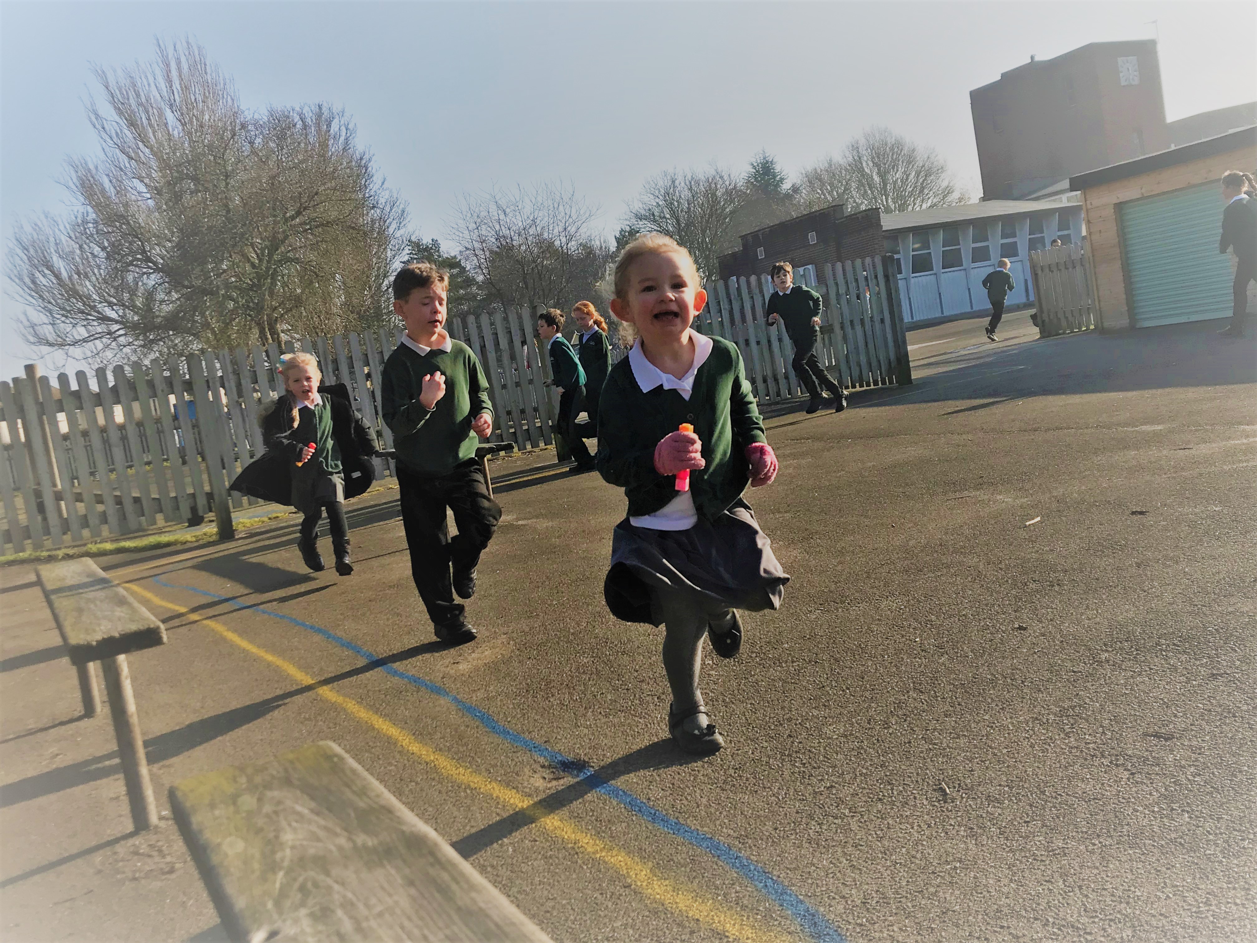 Children running in the playground