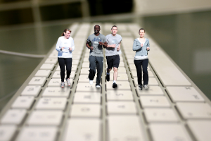 Group of runners edited to look as though they are running across a computer keyboard