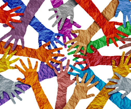 Fifteen to Twenty arms and hands cut out of different coloured paper on top of a white background.