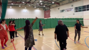 Ladies dancing in sports hall