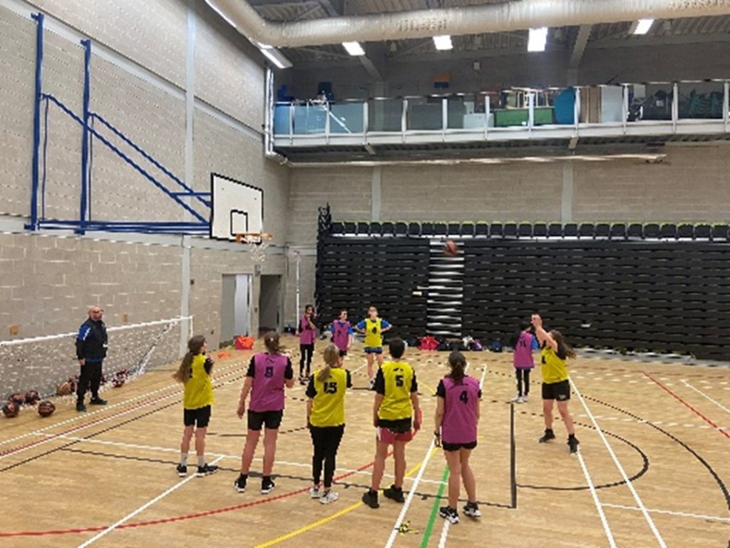 Girls playing basketball