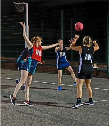 Girls playing netball