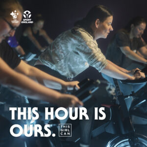 Woman on a spin bike in a gym