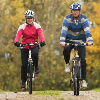 man and women riding bicycles