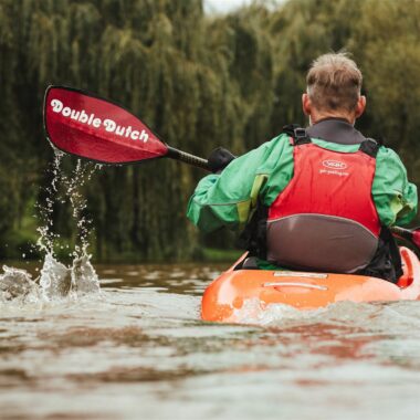 person in a canoe on the river