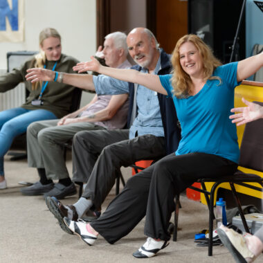 people doing seated exercises