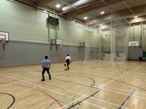 two people in a sports hall