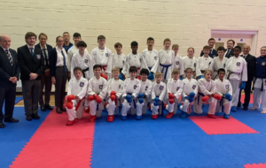 Group of young people in karate uniforms