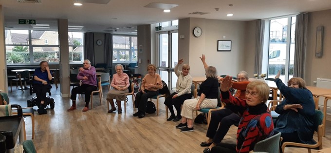 seated exercise class in a residential care home