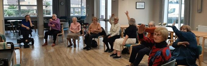 seated exercise class in a residential care home