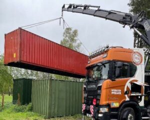 storage containers being delivered to golf club