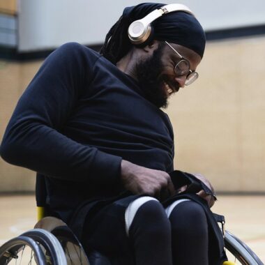 man in a wheelchair in a sportshall