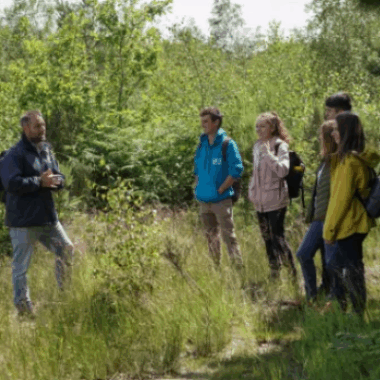 people standing in a field