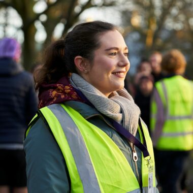 lady in a hiviz jacket at an event