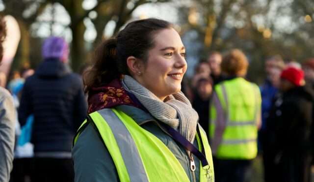 lady in a hiviz jacket at an event