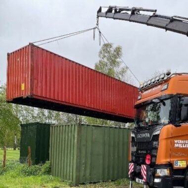 storage containers being delivered to golf club