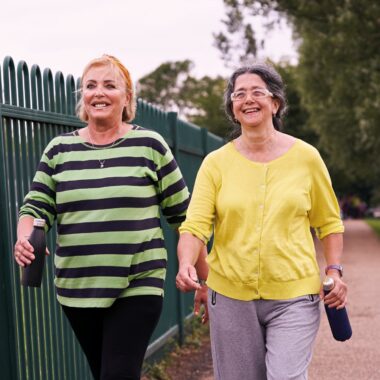two ladies walking in the park