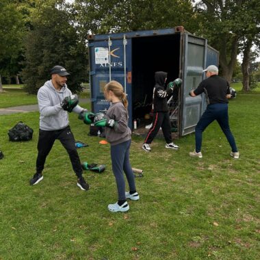 young people boxing in the park