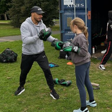 young people boxing in the park