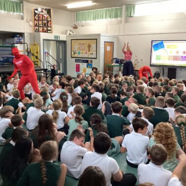 group of school children in a school hall